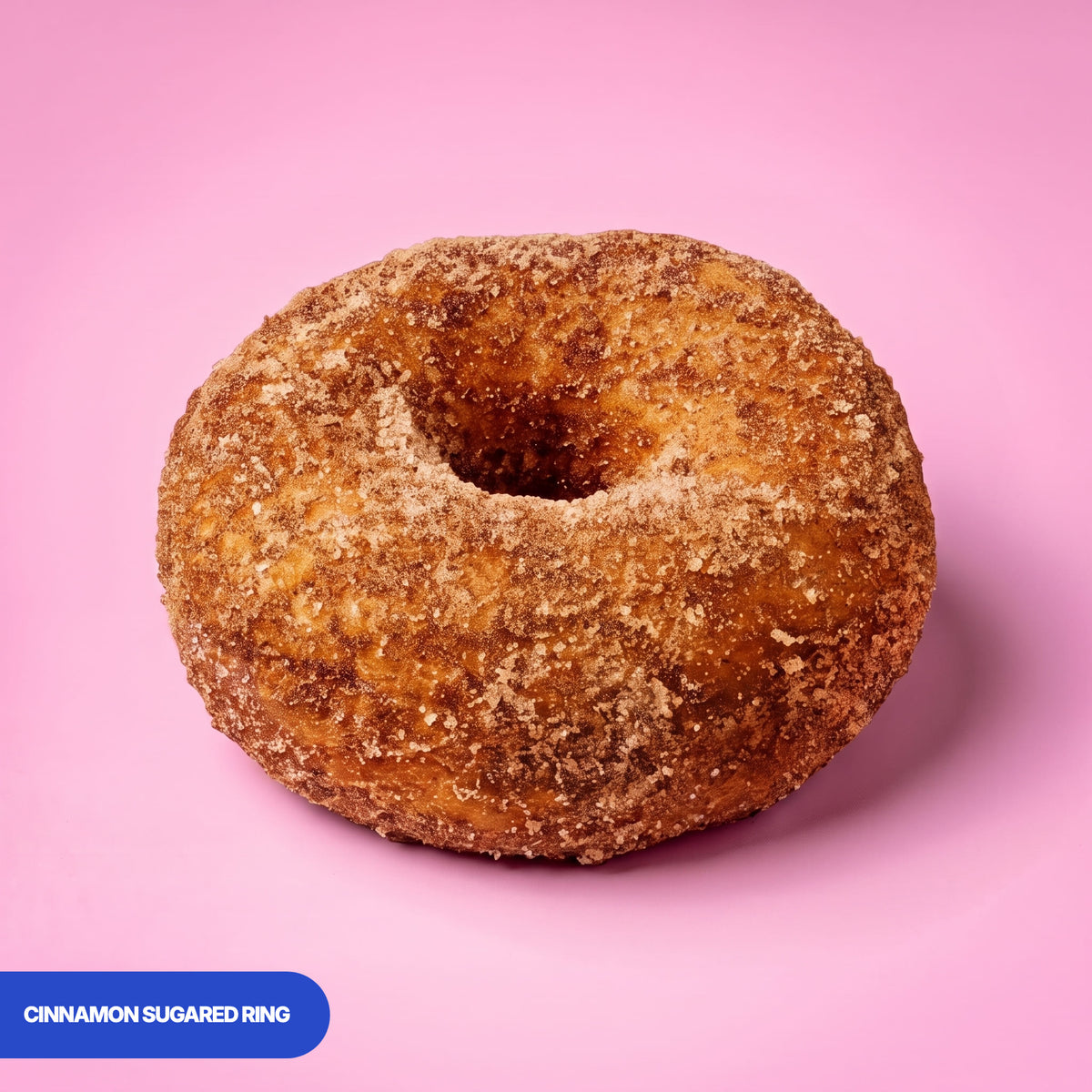 Gluten free vegan fried ring doughnut rolled in cinnamon sugar